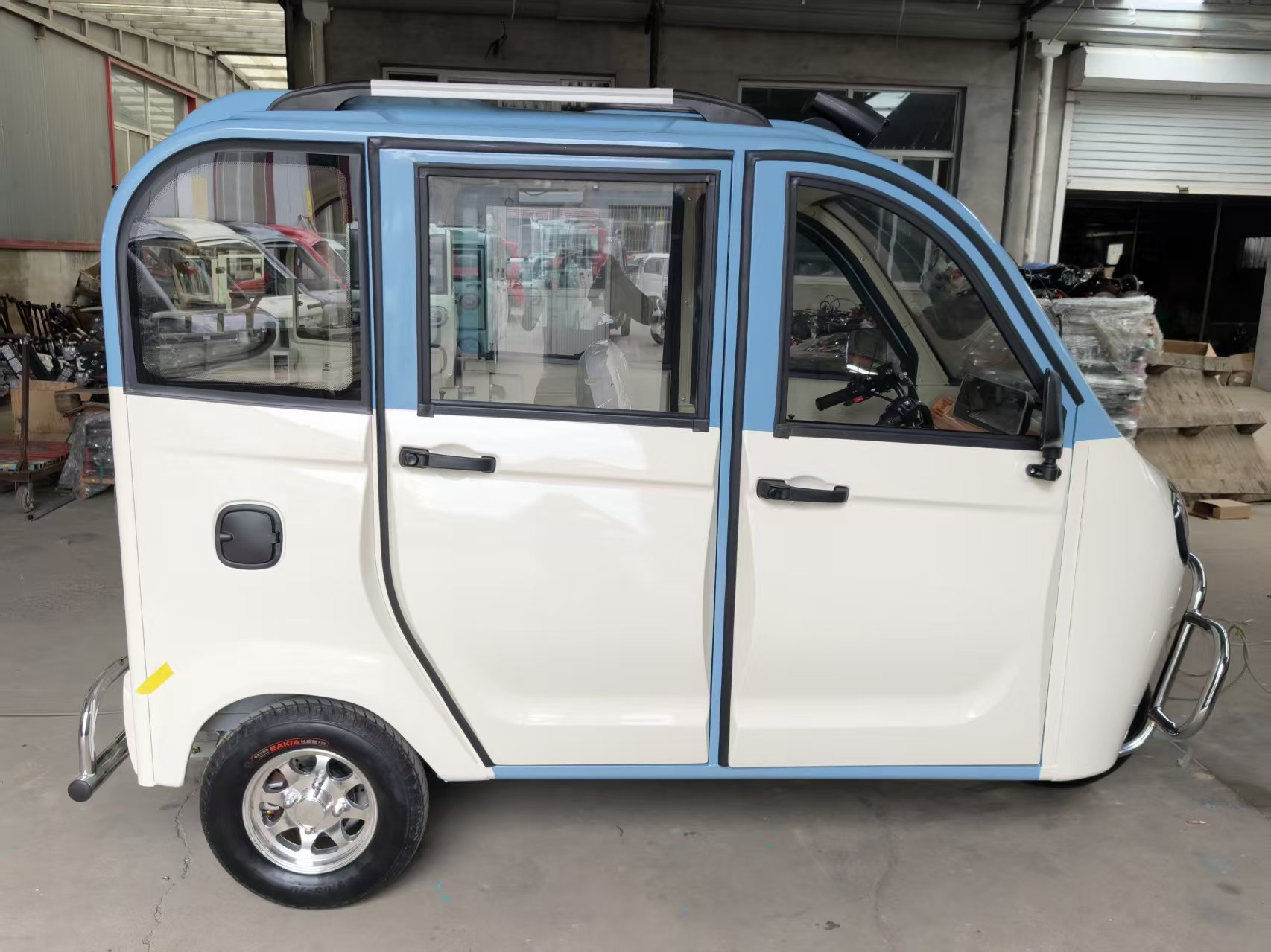 Covered electric tricycle