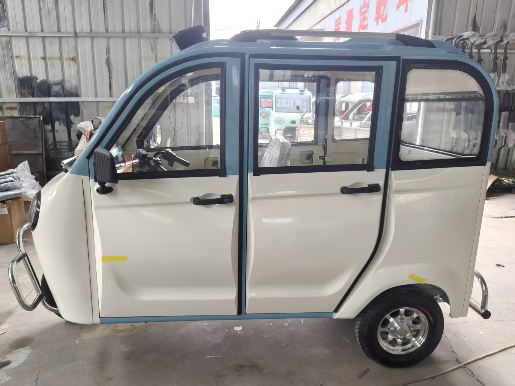 Covered electric tricycle